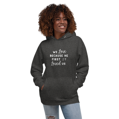 We Love Because He First Loved Us Unisex Hoodie - Cursive White Text